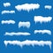 Set of snow icicles, snow cap isolated. Snowy elements on winter background. Vector template in cartoon style