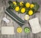 Set for spa handmade soap sponge lemon towel mirror perfume grass on wooden background
