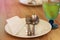 Set spoon and fork on dish on table wooden with romantic feeling