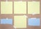 Set of square and torn paper notes with sticky tape. Collection of yellow and blue paper sheets on kraft paper background. Mockup