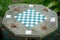 Set of stone table with chess checker-board