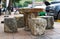 Set of stone tables and chairs in a gas station at Lop Buri