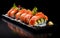 set of sushi on grey snowy background top view
