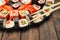 Set of sushi, maki and rolls closeup with chopsticks