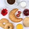 Set table with breakfast and coffee, orange juice from above