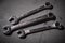 Set of three cast metal wrenches in various sizes