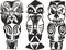 Set of three Maori totem figures