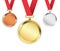 Set of three medals isolated on white background. Gold, silver, bronze medallions. Vector illustration