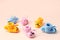 Set three Pairs of baby booties, shoes on pastel, cozy conceptual idea. Guess gender of the child, baby shower party. Preparation