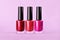 Set of three perfect bright sparkling nail polish bottles