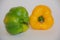 Set of three realistic bell peppers or bulgarian, green and yellow