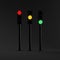 Set of three traffic lights with different color signals isolated on black background