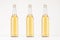 Set of three transparent longneck beer bottle 500ml with lager, mock up.