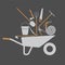 Set of tools for farmers farming. Tool in a wheelbarrow