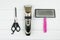 Set of tools for grooming: electric pet clipper, grooming scissors and wool brush