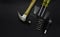 Set of tools, hammer, screwdrivers, nails, screws on a black background