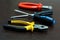 Set of tools repair fixing pliers screwdriver focus on foreground on blurred background close-up