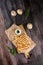 Set of tortilla quesadillas with turkey, mushrooms and souce on wooden background top view. Healthy food concept in rustic style