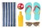 Set with towel and other beach accessories on white background