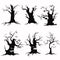 Set of tree silhouettes for Halloween. A collection of monster trees with bats and pumpkins. Black and white