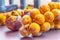 Set of tropical fruits long kong, a bunch of mangosteen and rambutan on the table closeup