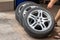 Set of used stylish car wheels with low profile summer tires. Sale of car spare parts