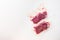 Set of vacuum packed organic beef meat   rump steak on white concrete  textured background, top view space for text