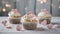 A set of vanilla Valentine\\\'s Day cupcakes, decorated with cream and heart-shaped decorations. Pink shades, love