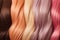 Set of various dyed human hair colorful strands background