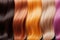 Set of various dyed human hair colorful strands background