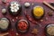 Set of various Indian spices on rusted wooden background