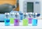 Set of various medical vials for injections. Ampoules with a liquid medication blue, pink and green colors. Small bottles with inj