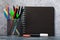 Set of various pencils, pens and a sketch pad with copy space