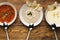 Set of various soups on wooden background, top view