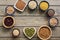 A set of various superfoods , whole grains,beans, seeds, legumes in bowls on a wooden plank table. Top view, copy space