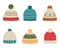 A set of various winter hats. Flat cartoon style.