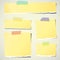 Set of various yellow torn note papers with