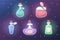 A set of vector magic bottles and flasks. Colorful magic potions. Cartoon cliparts, symbols