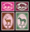 Set of vector postage stamps with boar, bison, deer, horse