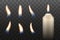 Set of vector realistic candle flames on dark backgroun