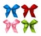 Set of Vector Shiny Satin Gift Bow Isolated on White Background. Collection of textile bow of ribbon red, pink, green, purple, i