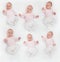 Set of very happy baby in white and pink body suit lying on his back on the white. Baby looking straight at the camera.