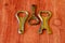 Set of vintage bottle openers on brown wooden background