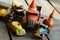 Set of vintage toys - convertible toy car, trucks (lorries) toy, post car toy and spinning (humming) tops