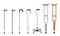 Set of walking sticks and crutches. Telescopic aluminum cane, elegant wooden walking cane, ergonomic canes with curved