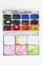 Set of watercolor paints isolated for painting closeup. Selective focus. Art, creative background with copy space