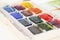 Set of watercolor paints isolated for painting closeup. Selective focus. Art, creative background with copy space