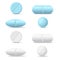 Set of white and blue round and oval medicine pills of various k