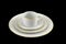 Set of white dinnerware with gold trim