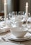 A set of white glassware. Table setting